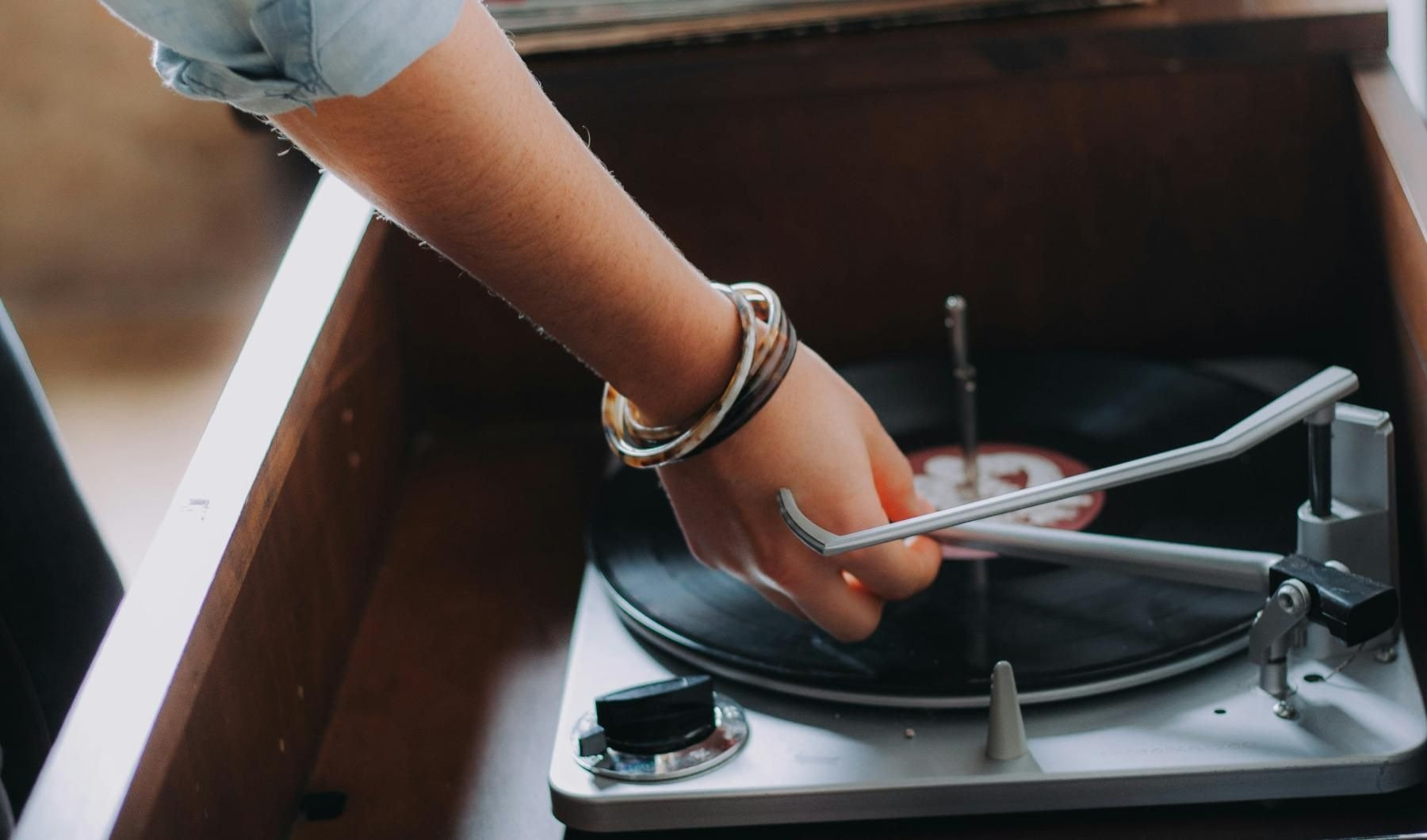 a person playing a record