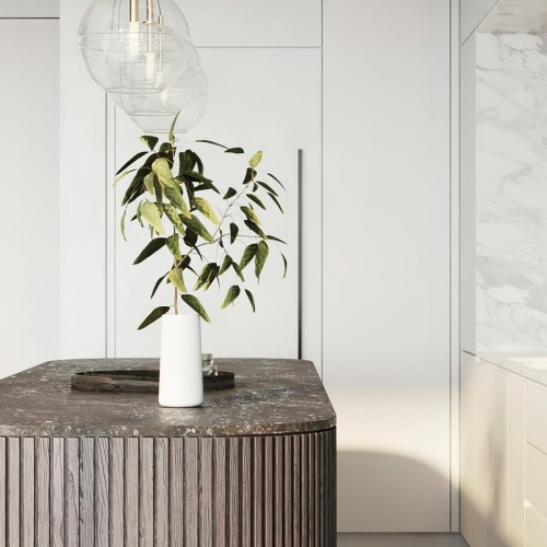 Spacious kitchens with thoughtful details a table with a vase of flowers