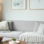 a living room with a couch and a coffee table