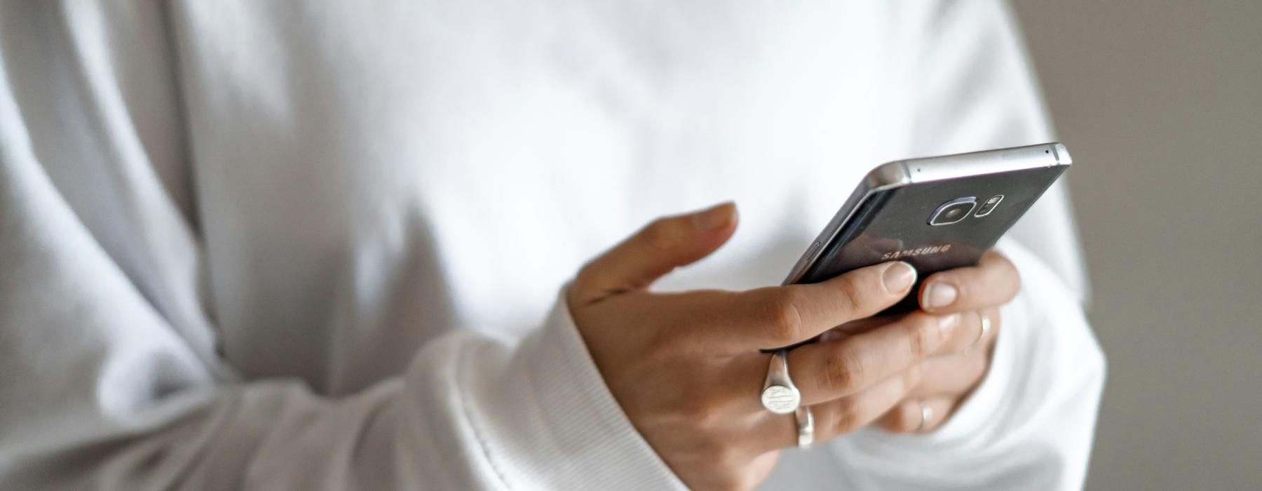 a man holding a cell phone